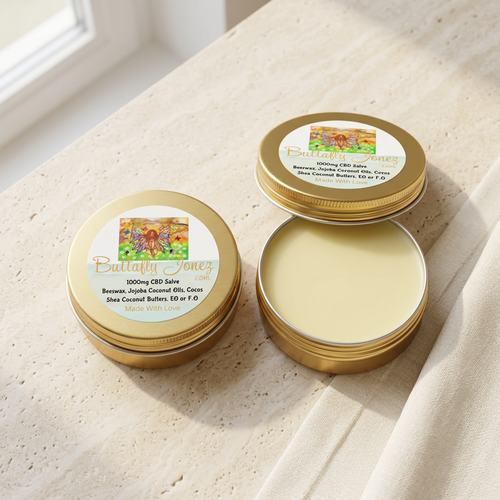 CBD salve tins in a warm spa setting
